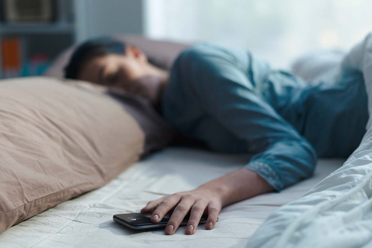 Why You Should Keep Your Phone on a Side Table and Not Under Your Pillow While Sleeping